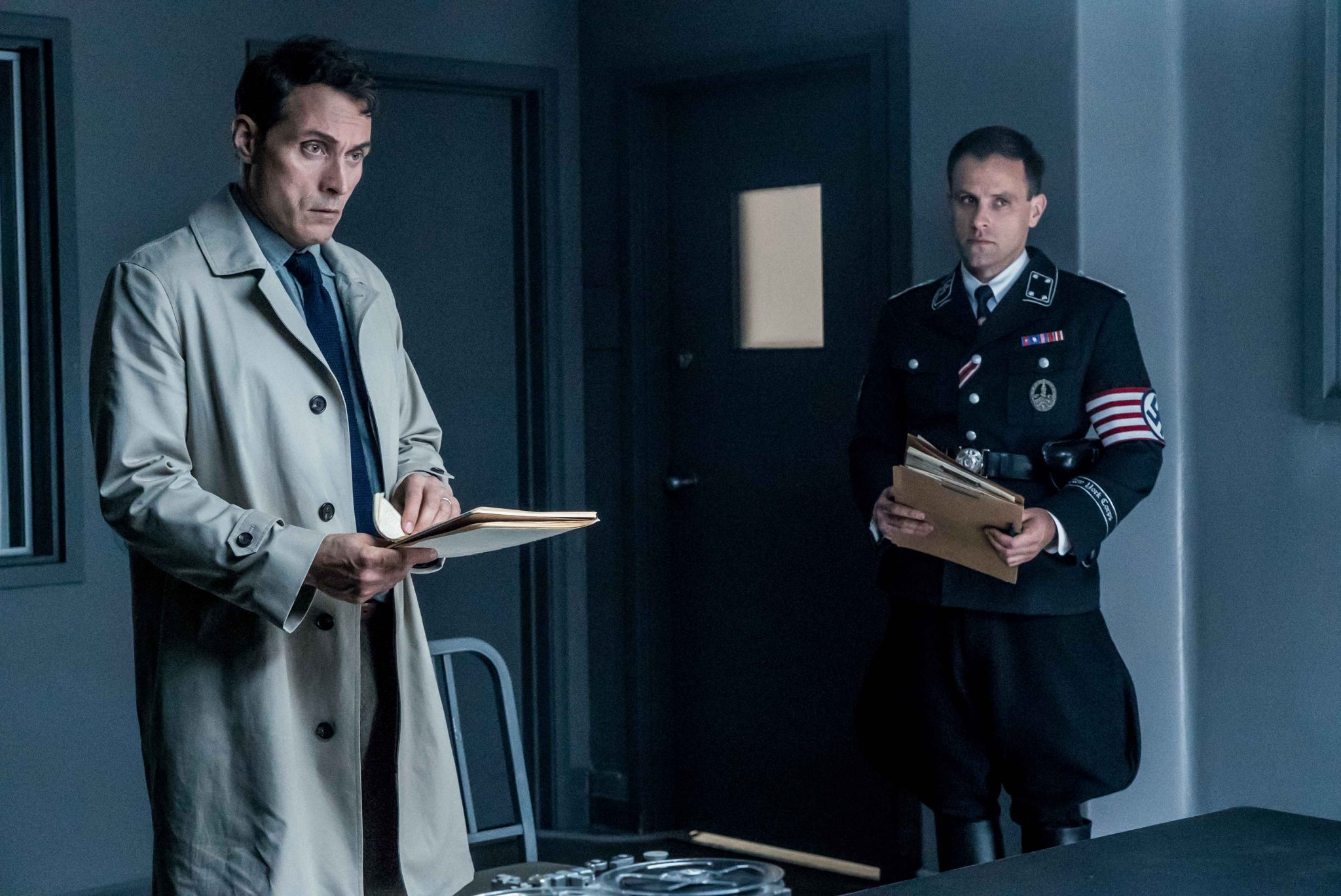 Rufus Sewell (l) as Obergruppenführer John Smith in The Man in the High Castle: Season 2. Photo Credit: Liane Hentscher/Amazon Prime Video