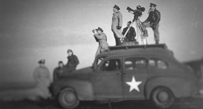 John Ford shooting WWII propaganda from Netflix Original Five Came Back (2017). Courtesy of Netflix.