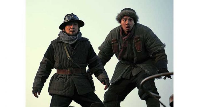 Jackie Chan and Alan Ng in Railroad Tigers (2016)