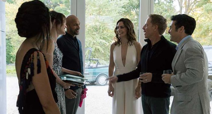 Cobie Smulders, Keegan-Michael Key, Annie Parisse, and Fred Savage in Friends from College: Season 1, Episode 1. Photo Credit: Barbara Nitke/Netflix