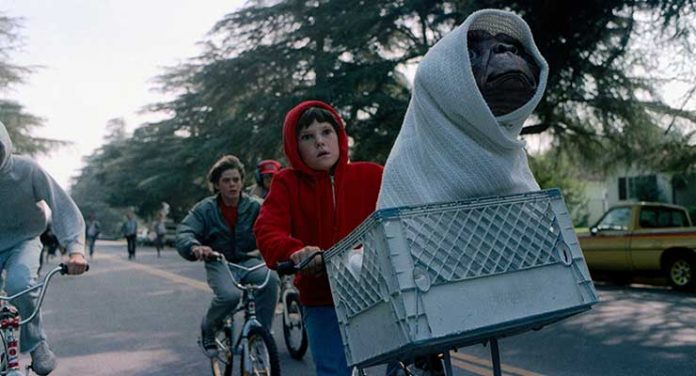 C. Thomas Howell, Henry Thomas, Robert MacNaughton, K.C. Martel, and Pat Welsh in E.T. the Extra-Terrestrial (1982) Available on 4K Ultra HD Blu-ray from Universal Pictures Home Entertainment.