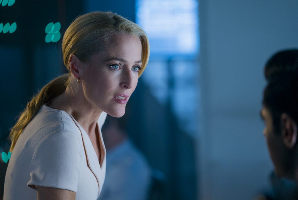 The Spy Who Dumped Me Day 12 Gillian Anderson as “Wendy” and Hasan Minhaj as “Duffer” in THE SPY WHO DUMPED ME. Photo Credit: Hopper Stone/SMPSP