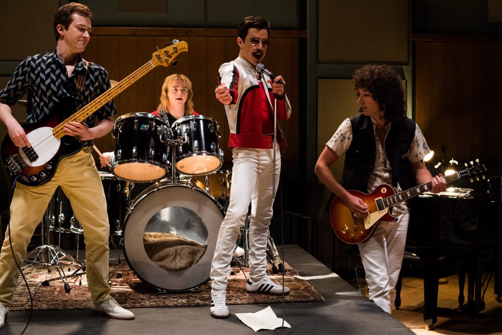 BOHEMIAN RHAPSODY L-R: Joe Mazzello (John Deacon), Ben Hardy (Roger Taylor), Rami Malek (Freddie Mercury), and Gwilym Lee (Brian May) star in Twentieth Century Fox’s BOHEMIAN RHAPSODY. Photo Credit: Alex Bailey.