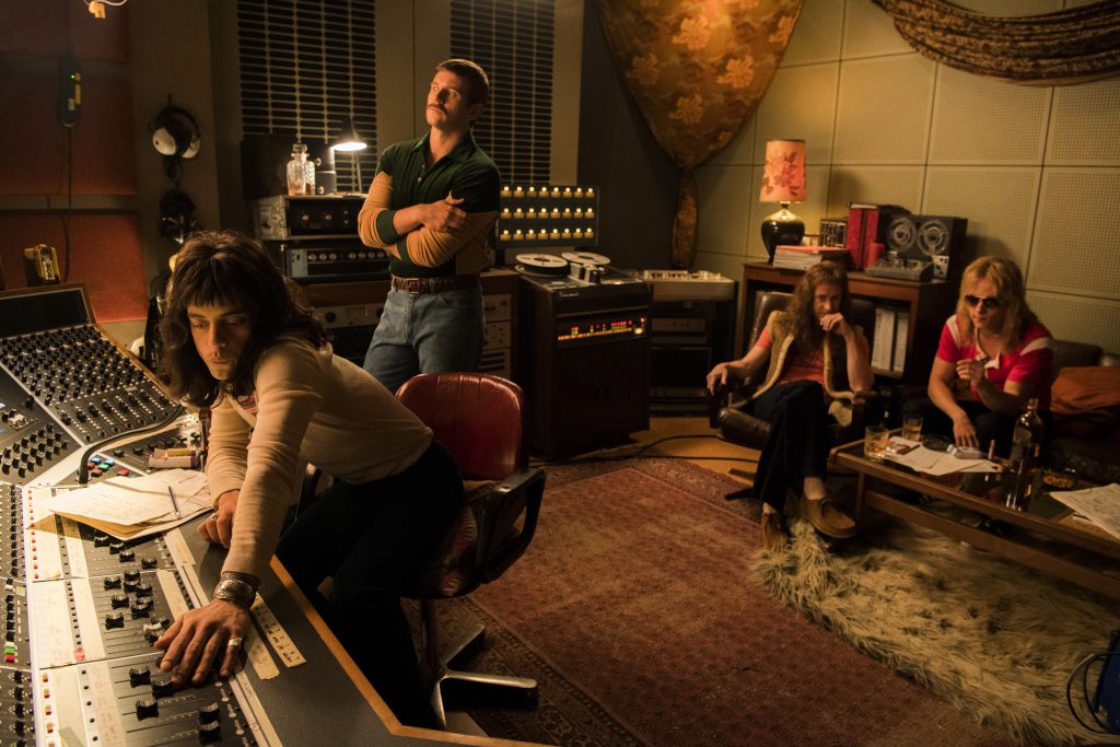 BOHEMIAN RHAPSODY Rami Malek (Freddie Mercury), Allen Leech (Paul Prenter), Joe Mazzello (John Deacon), and Ben Hardy (Roger Taylor) in Twentieth Century Fox’s BOHEMIAN RHAPSODY. Photo Credit: Alex Bailey.