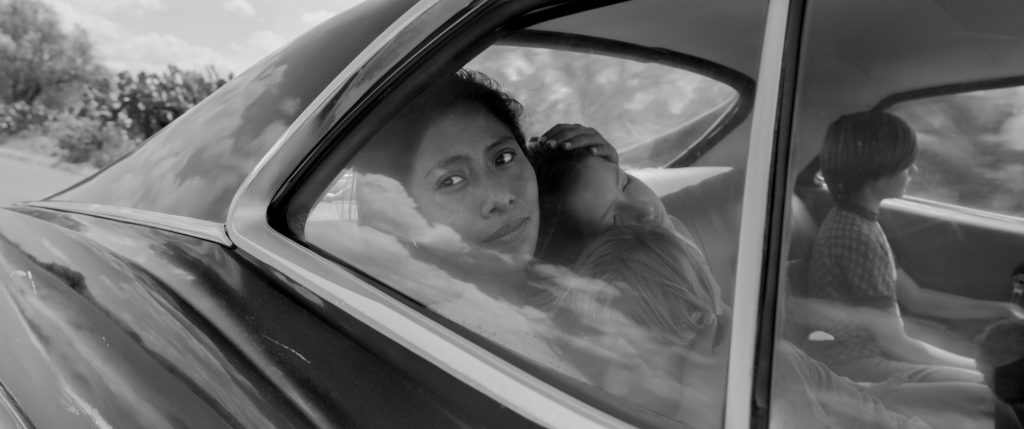 Yalitza Aparicio as Cleo, Marco Graf as Pepe, Carlos Peralta Jacobson as Paco, and Daniela Demesa as Sofi in Roma, written and directed by Alfonso Cuarón. Image by Alfonso Cuarón.