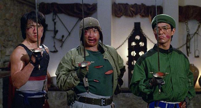 Jackie Chan, Sammo Kam-Bo Hung, and Biao Yuen in Wheels on Meals (1984)
