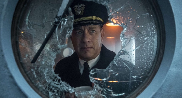 Capt Krause (TOM HANKS) peers out the broken pilot house window in TriStar Pictures' GREYHOUND.