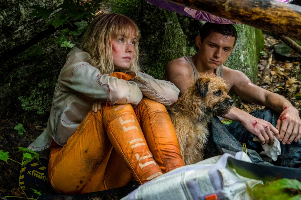 Tom Holland as Todd Hewitt and Daisy Ridley as Viola Eade in Chaos Walking. Photo Credit: Murray Close