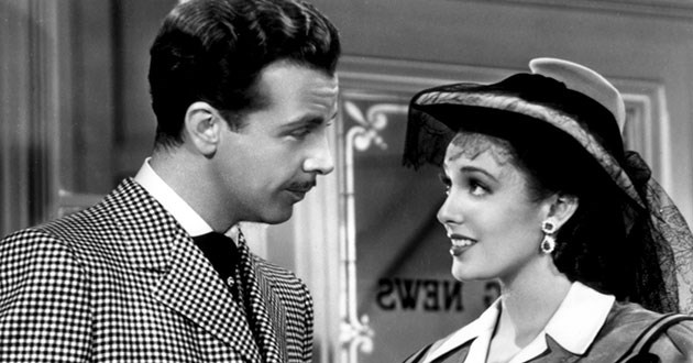 Dick Powell and Linda Darnell in It Happened Tomorrow (1944)