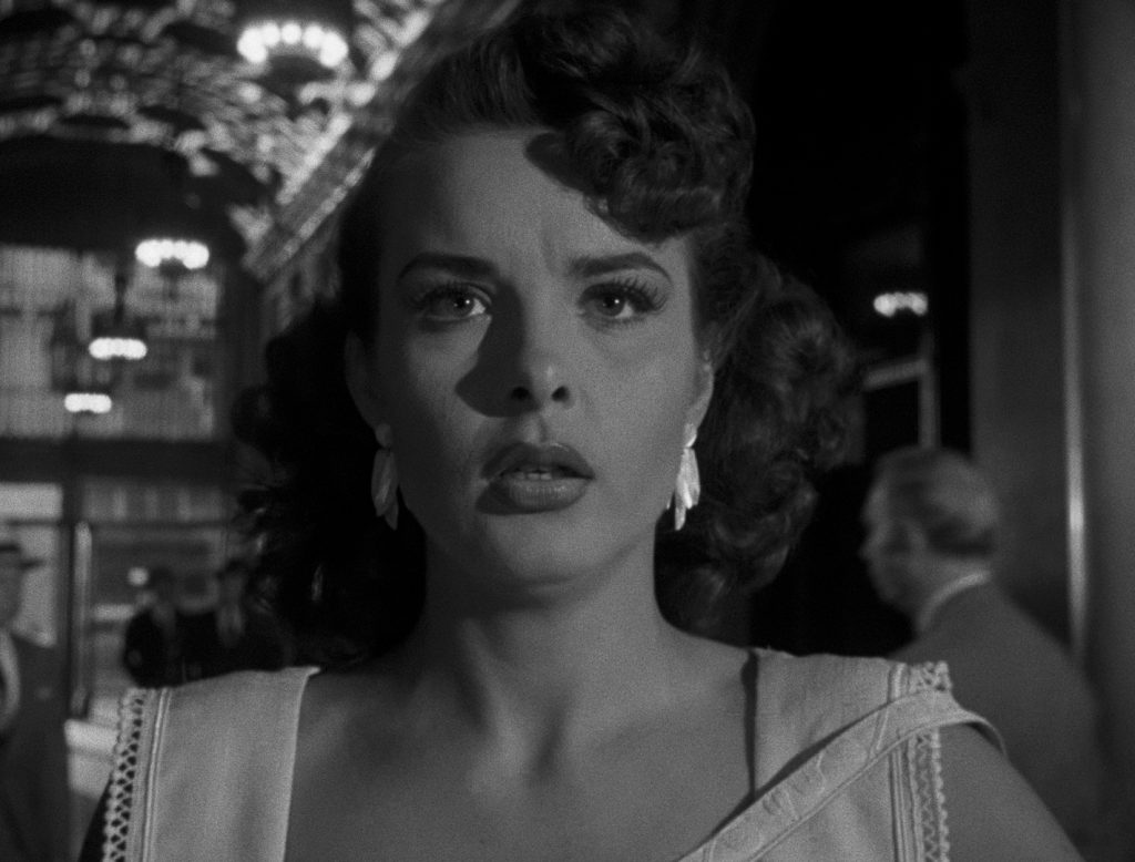 Jean Peters in Pickup on South Street (1953) screen capture courtesy of the Criterion Collection.Richard Widmark in Pickup on South Street (1953) screen capture courtesy of the Criterion Collection.