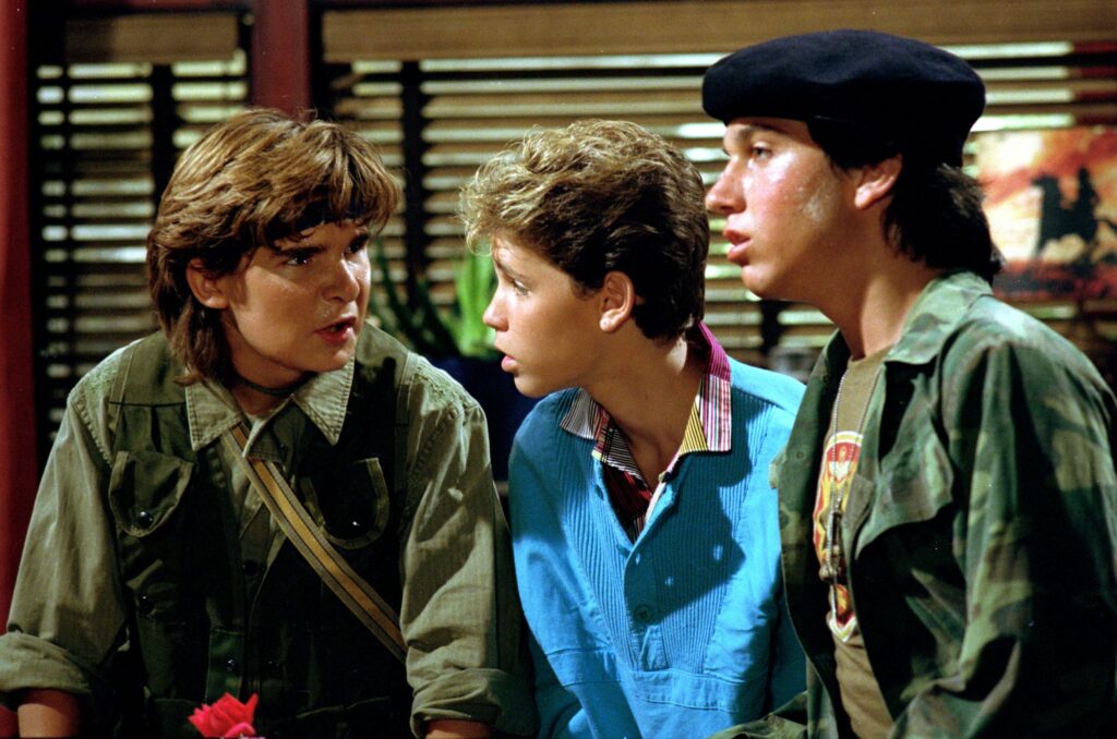 Corey Feldman, Corey Haim, and Jamison Newlander in The Lost Boys (1987)