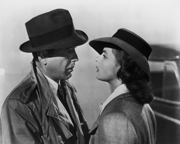 Humphrey Bogart (1899 - 1957) and Ingrid Bergman (1915 - 1982) star in the Warner Brothers film 'Casablanca', 1942. (Photo by Popperfoto/Getty Images)