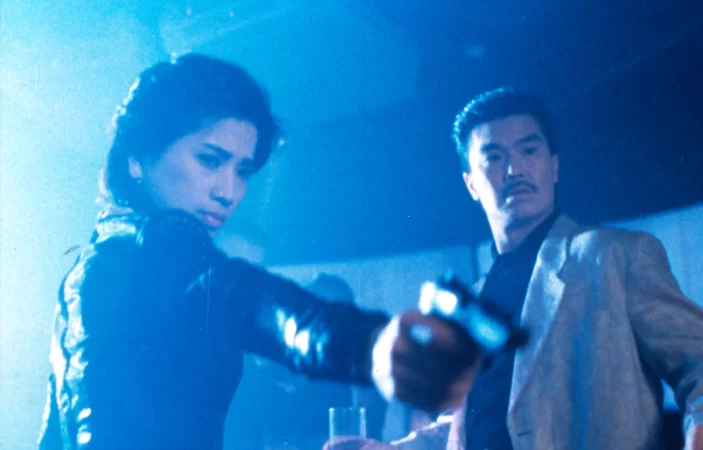 Michiko Nishiwaki and Melvin Wong in In the Line of Duty III (1988)