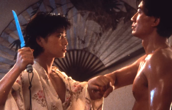 Michiko Nishiwaki and Stuart Ong in In the Line of Duty III (1988)