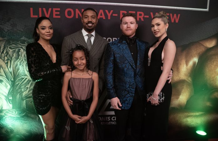 (l-r.) Tessa Thompson stars as Bianca, Mila Kent as Amara, 

Michael B. Jordan as Adonis Creed and Canelo as himself in

CREED III 

A Metro Goldwyn Mayer Pictures film

Photo credit: Eli Ade

© 2023 Metro-Goldwyn-Mayer Pictures Inc. All Rights Reserved

CREED is a trademark of Metro-Goldwyn-Mayer Studios Inc. All Rights Reserved.