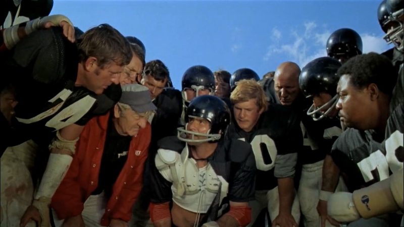 Burt Reynolds, John Steadman, and Robert Tessier in The Longest Yard (1974)