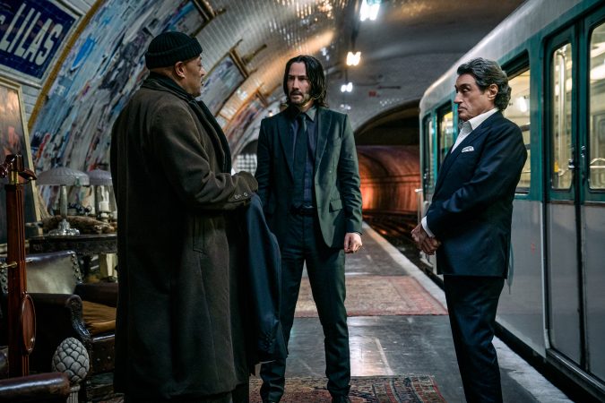 Laurence Fishburne as Bowery King, Keanu Reeves as John Wick, and Ian McShane as Winston in John Wick 4. Photo Credit: Murray Close