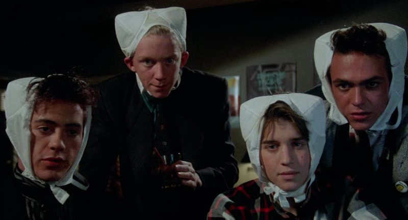 Robert Downey Jr., Anthony Michael Hall, Ilan Mitchell-Smith, and Robert Rusler in Weird Science (1985)