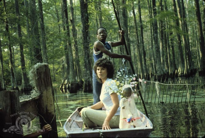 Adrienne Barbeau and Reggie Batts in Swamp Thing (1982)