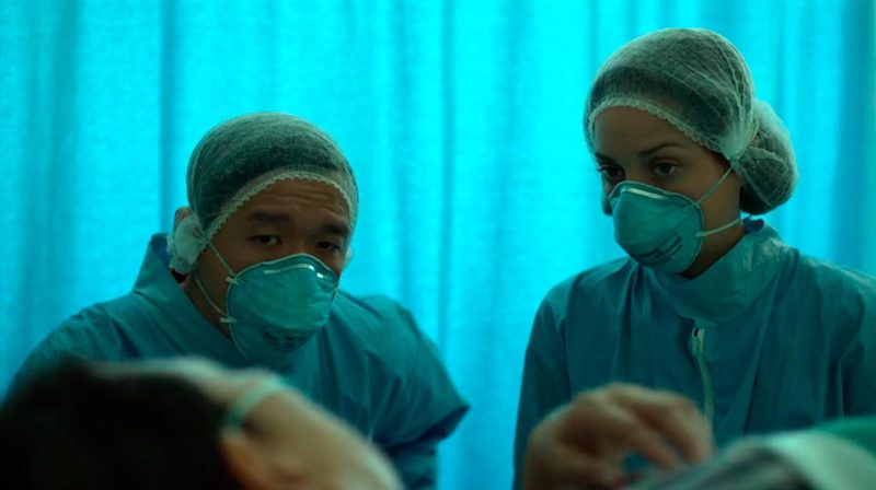Marion Cotillard and Chin Han in Contagion (2011)
