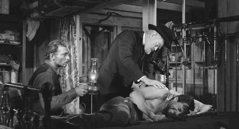 Lee Van Cleef, Peter Baldwin, and John McIntire in The Tin Star (1957)